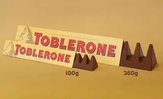 CURIOSIDADE: A TOBLERONE NÃO É MAIS CHOCOLATE SUÍÇO; ENTENDA