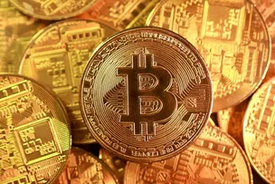 VALE INVESTIR EM BITCOIN EM 2026? MERCADO VÊ MENOS RETORNO, MAS MAIS SEGURANÇA